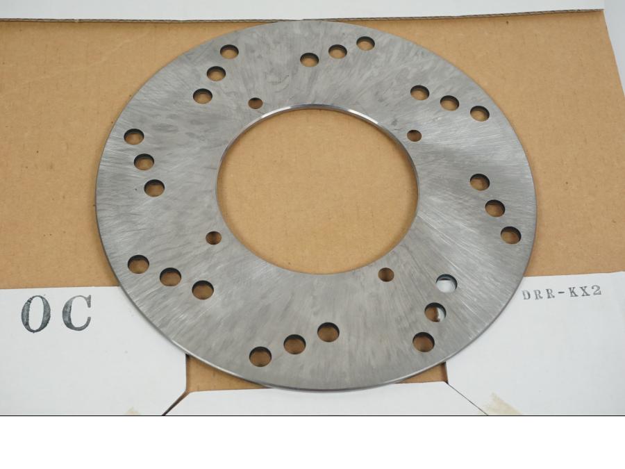 Baksidan på Bromsskiva från en Kawasaki KX 85 -2010 motorcykel.