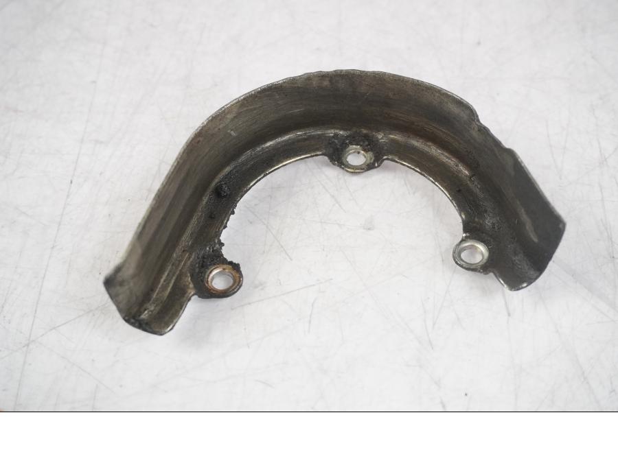 Snett uppifrån på Kedjeskydd från en KTM 125 Duke -2017 motorcykel.