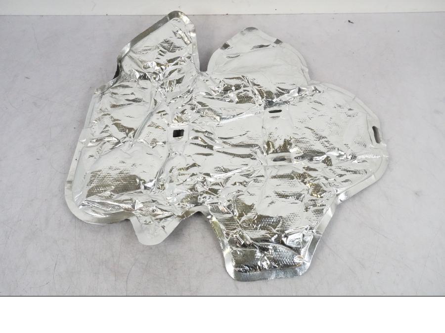 Vänster sida på Värmeskydd från en Suzuki GSX-R 1000 -2008 motorcykel.