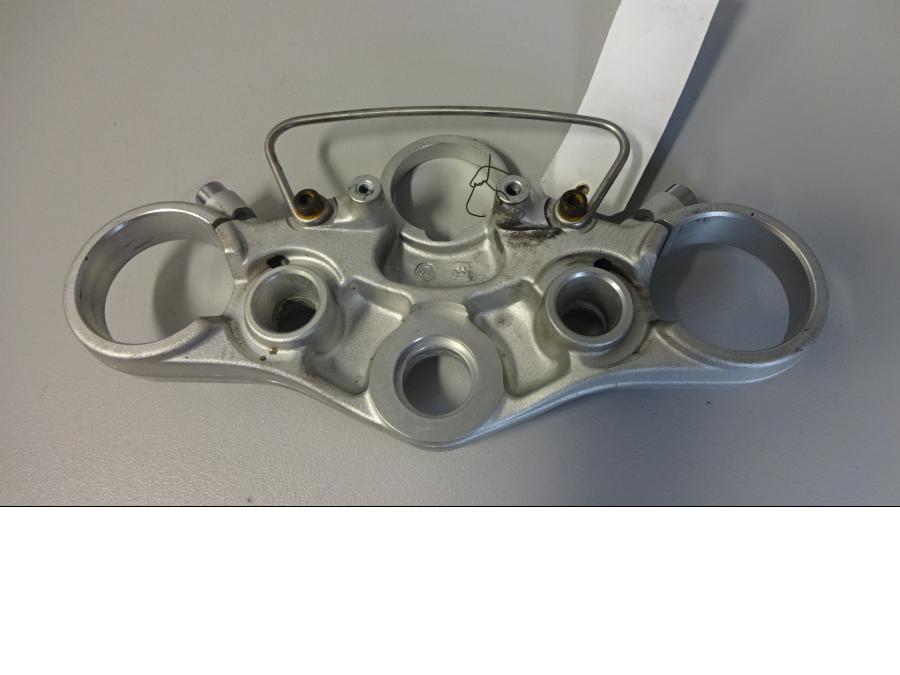 Baksidan på Gaffelkrona från en Triumph Speed Triple -2011 motorcykel.