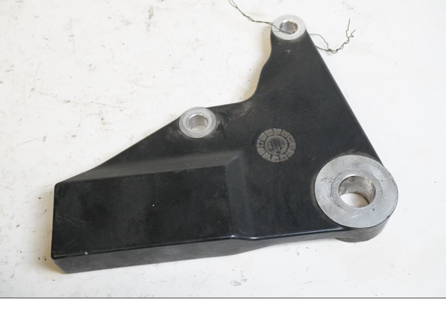 Baksidan på Bromsoksfäste från en Triumph Bonneville -2012 motorcykel.