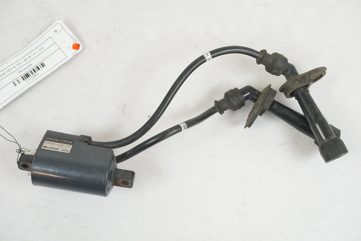 Framsidan på Tändspole från en Suzuki GSX-R 750 -1988 motorcykel.