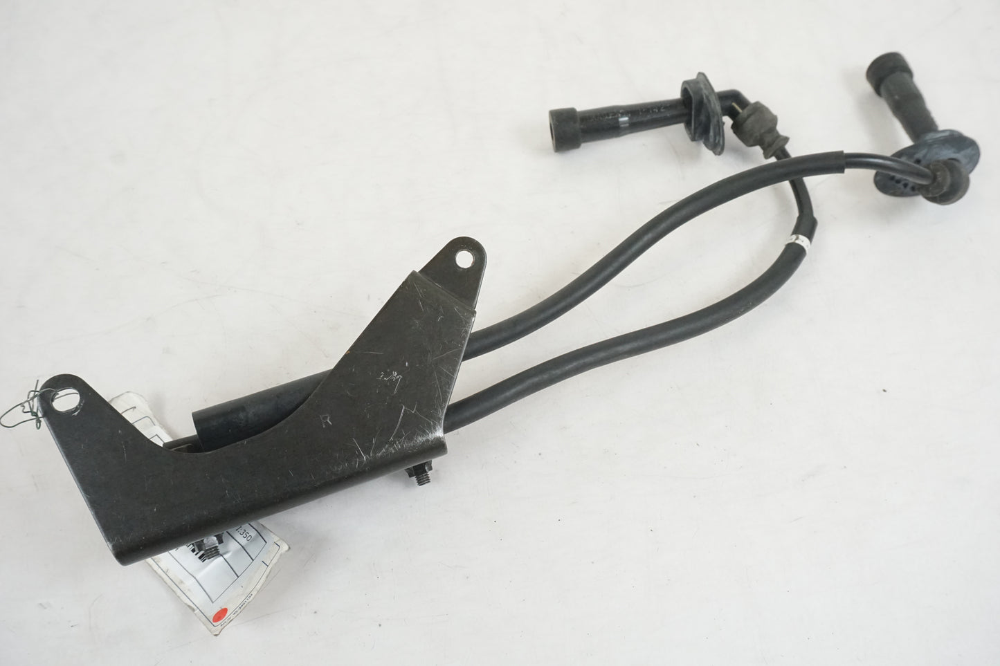 Vänster sida på Tändspole från en Suzuki GSX 1400 -2003 motorcykel.