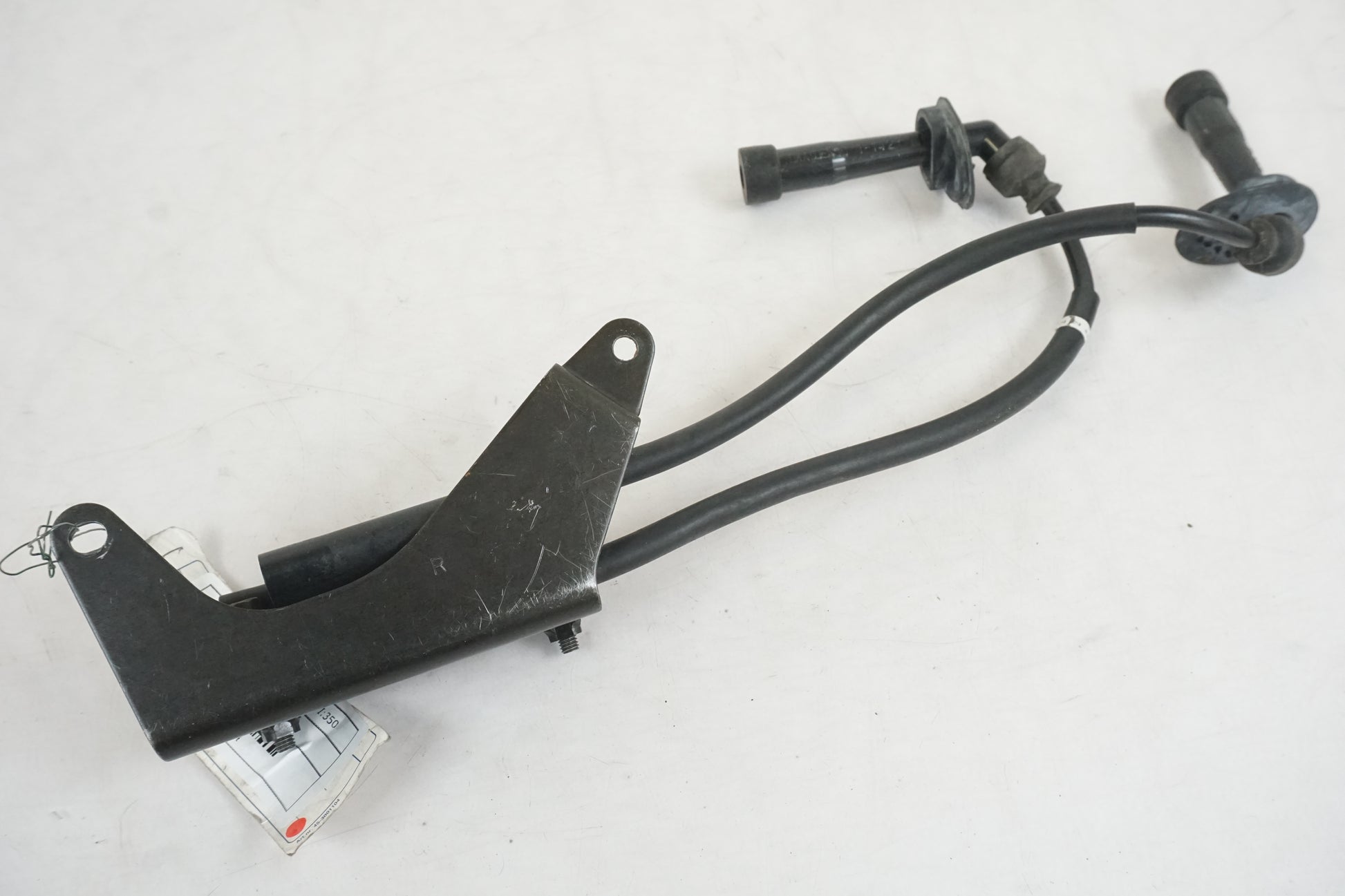 Vänster sida på Tändspole från en Suzuki GSX 1400 -2003 motorcykel.