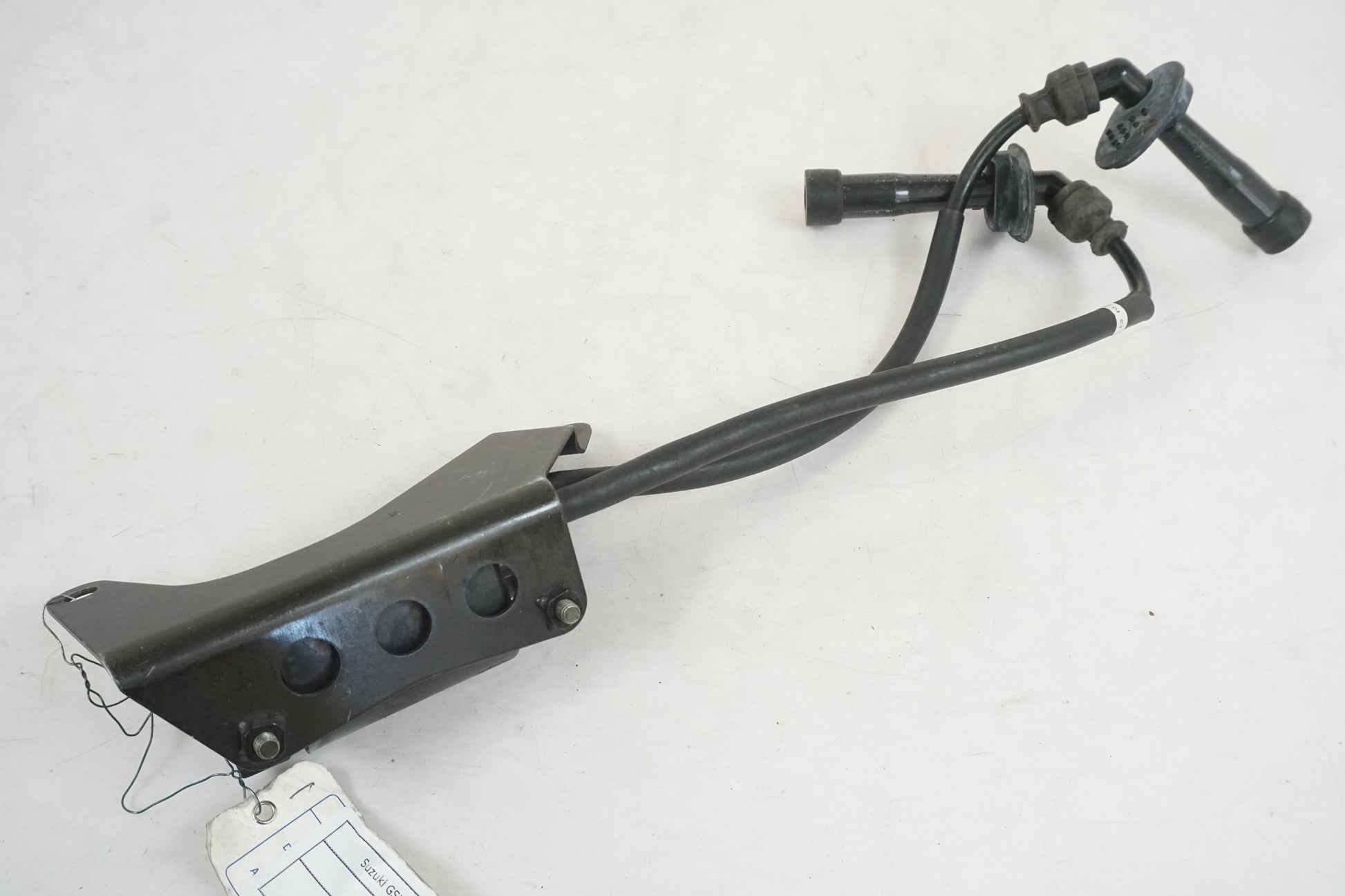 Snett uppifrån på Tändspole från en Suzuki GSX 1400 -2003 motorcykel.