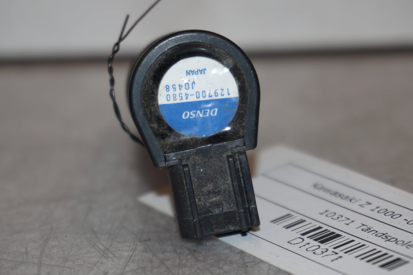 Snett nerifrån på Tändspole från en Kawasaki Z 1000 -2008 motorcykel.