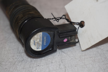 Snett nerifrån på Tändspole från en Kawasaki Versys 650 -2007 motorcykel.