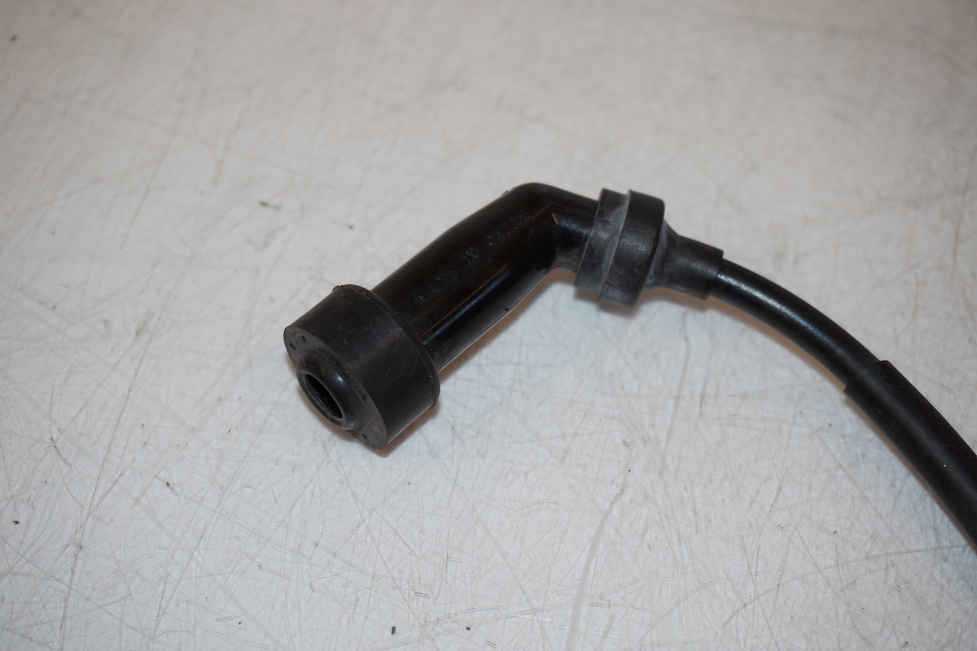 Snett nerifrån på Tändspole från en Yamaha XV 125 -1998 motorcykel.