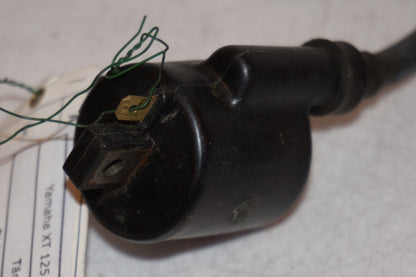 Snett uppifrån på Tändspole från en Yamaha XT 125 X -2005 motorcykel.