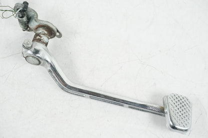 Framsidan på Bromspedal från en Yamaha V-MAX 1200 -1997 motorcykel.