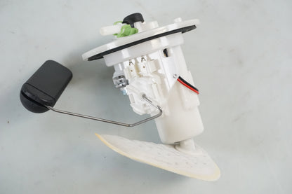 Framsidan på Bensinpump insprut från en Honda ANF 125 -2008 motorcykel.