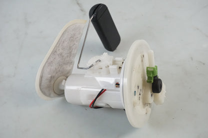 Framsidan på Bensinpump insprut från en Honda ANF 125 -2009 motorcykel.