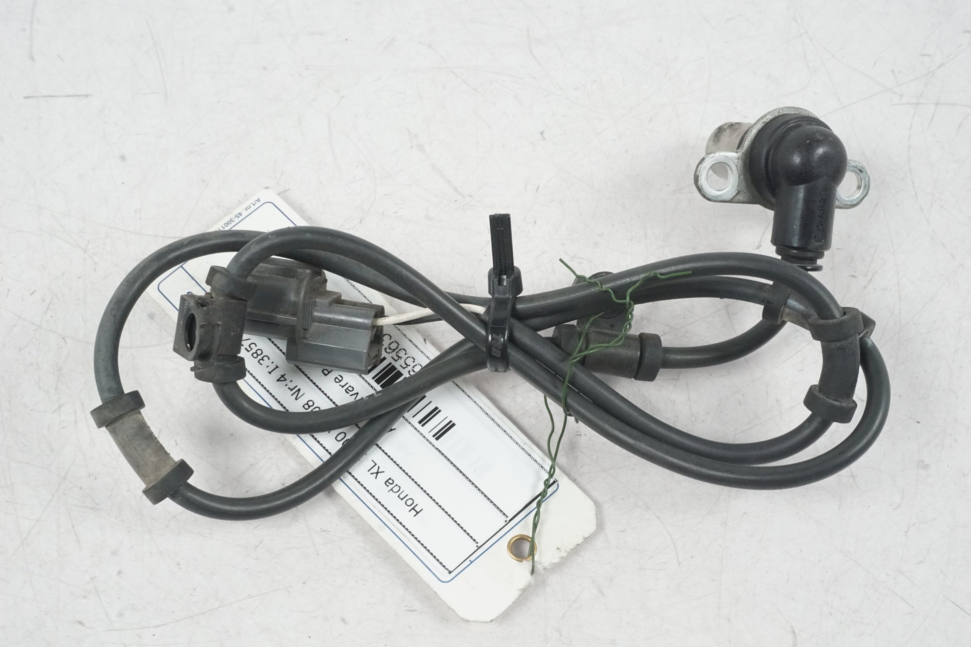 Baksidan på ABS givare från en Honda XL 1000 V -2008 motorcykel.