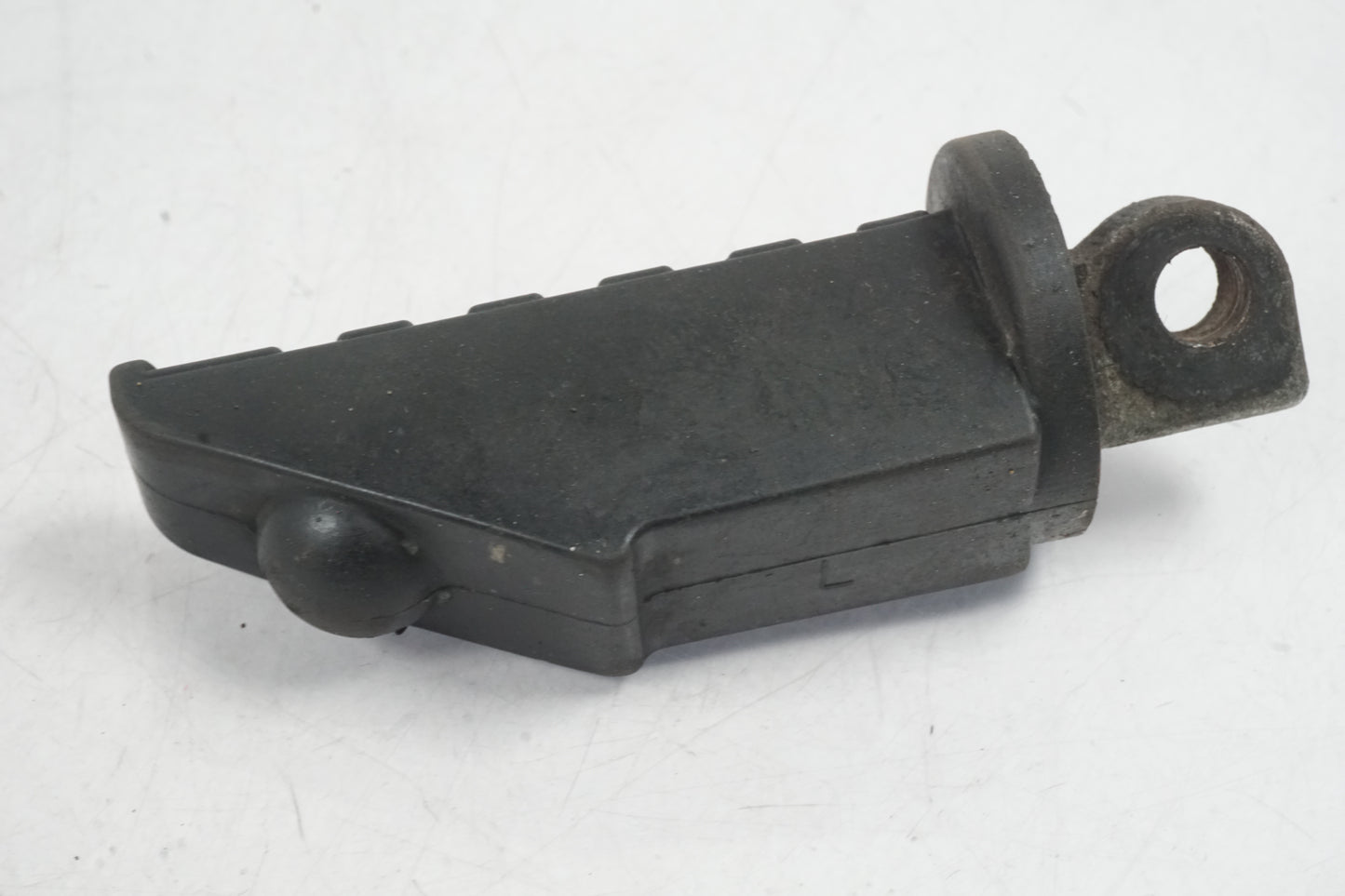 Baksidan på Fotpinne från en Buell X1 Lightning -2002 motorcykel.