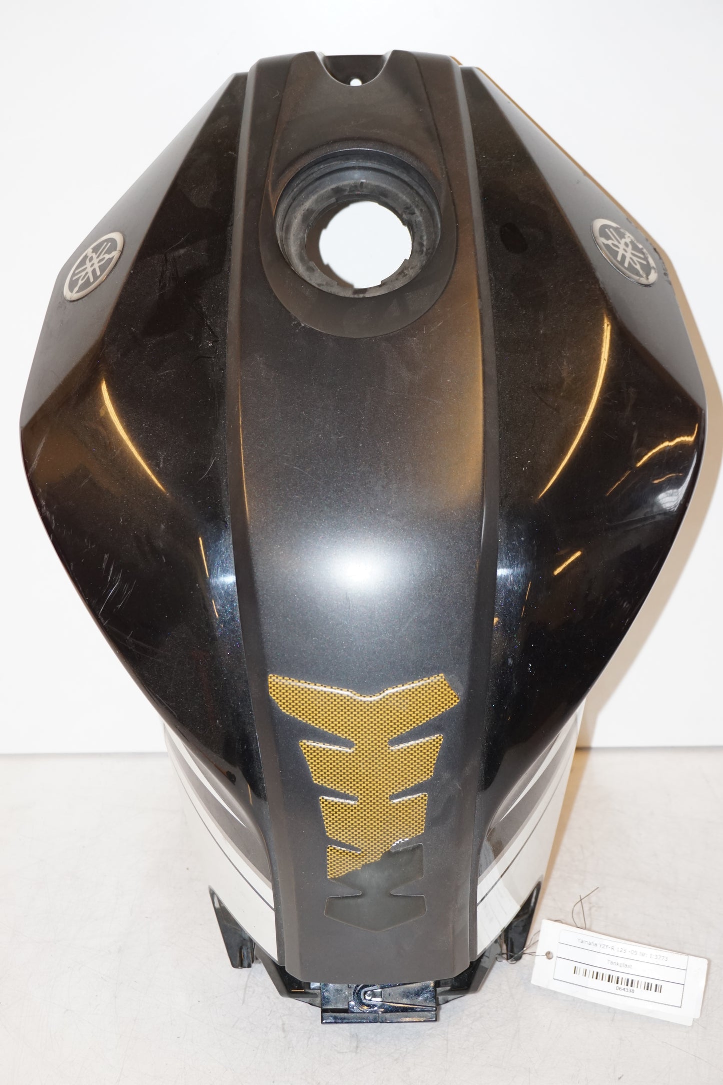 Framsidan på Bensintankskåpa från en Yamaha YZF-R 125 -2009 motorcykel.