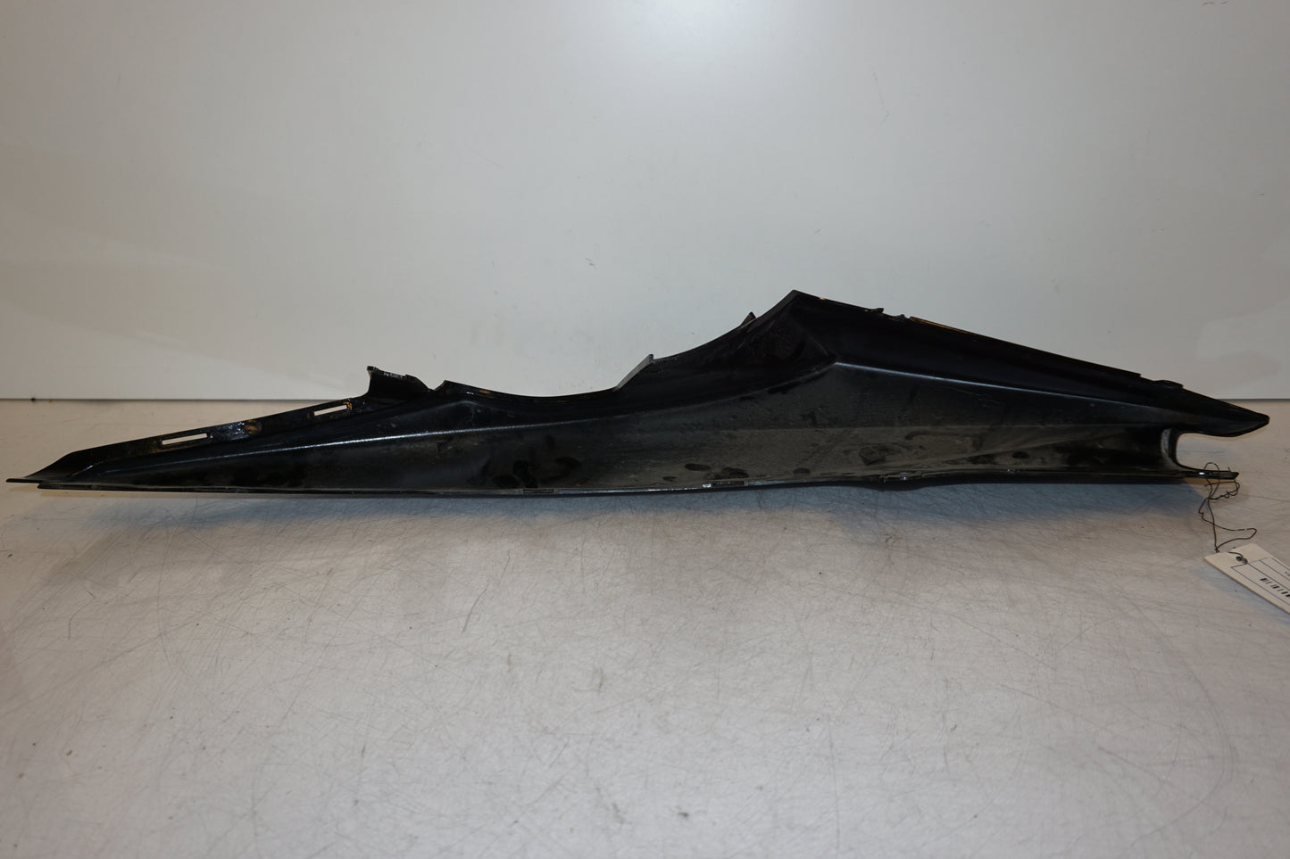 Höger sida på Bakvinge från en Yamaha YZF-R 125 -2009 motorcykel.