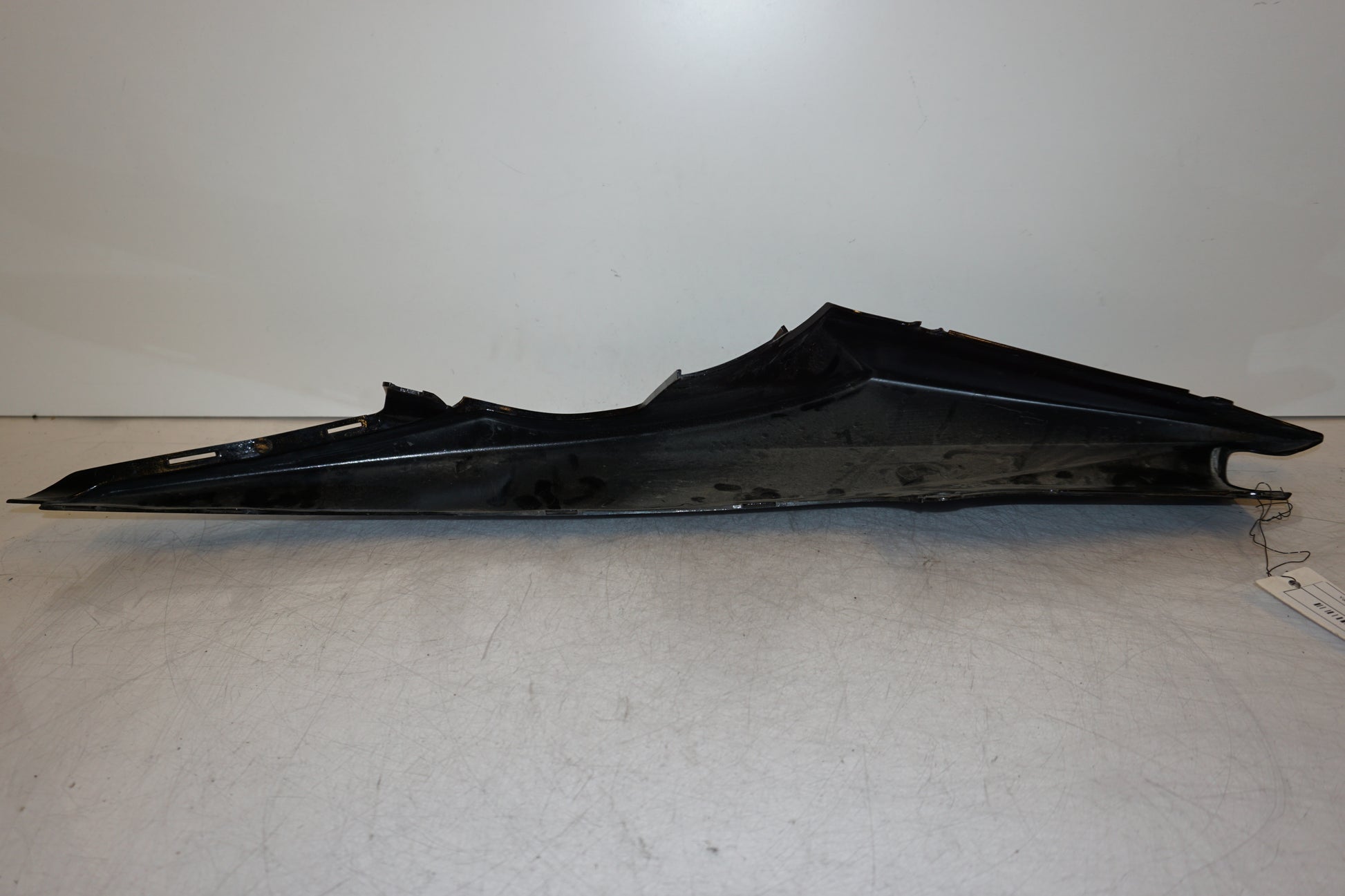 Höger sida på Bakvinge från en Yamaha YZF-R 125 -2009 motorcykel.