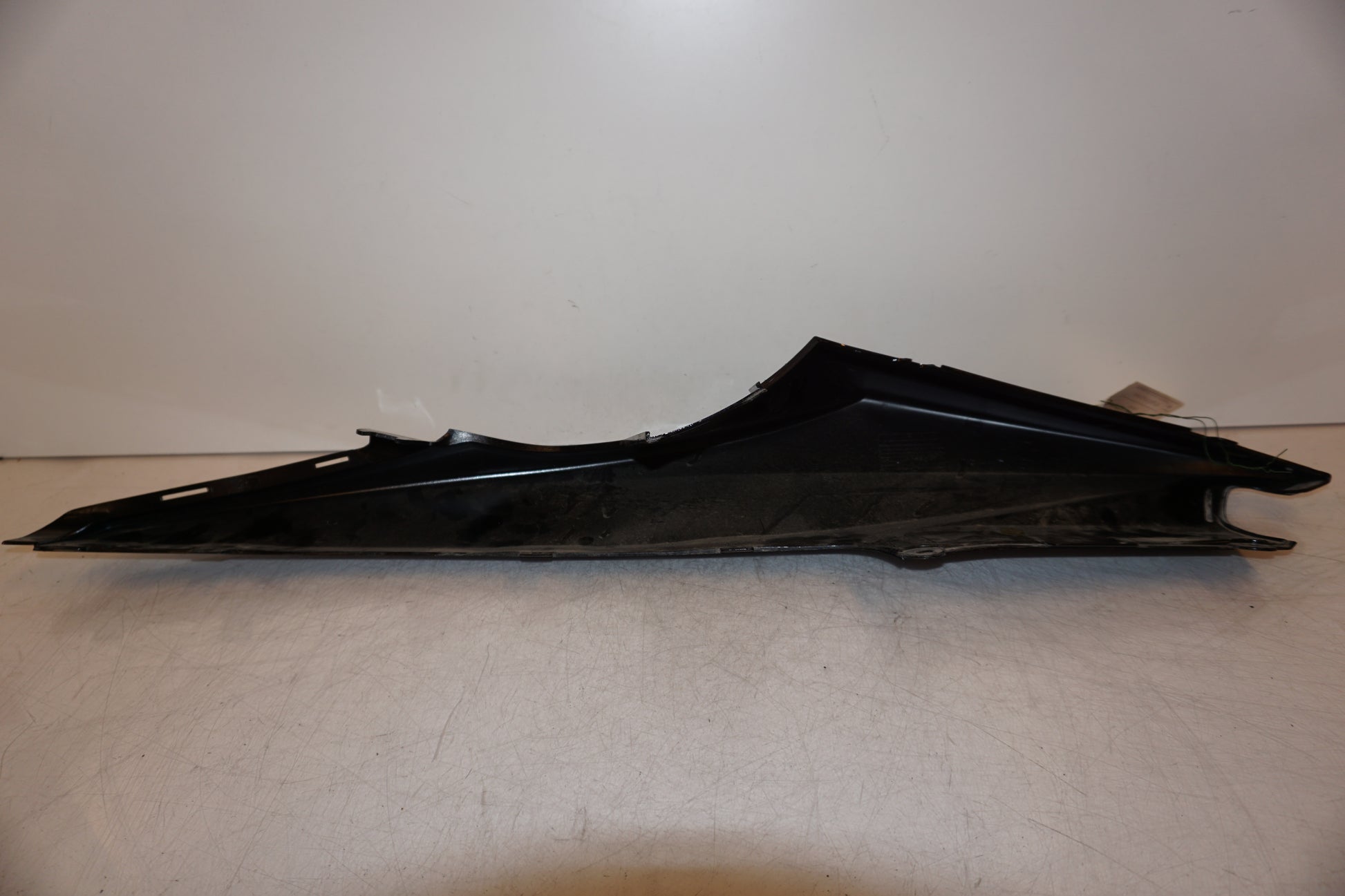 Höger sida på Bakvinge från en Yamaha YZF-R 125 -2010 motorcykel.