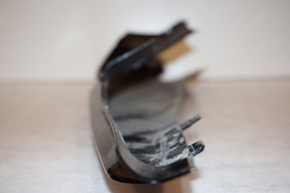 Vänster sida på Bakvinge från en Yamaha YZF-R 125 -2010 motorcykel.