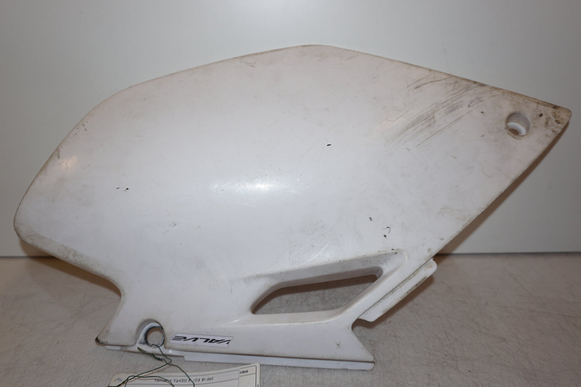Framsidan på Sidopanel från en Yamaha Yz450 F -2003 motorcykel.