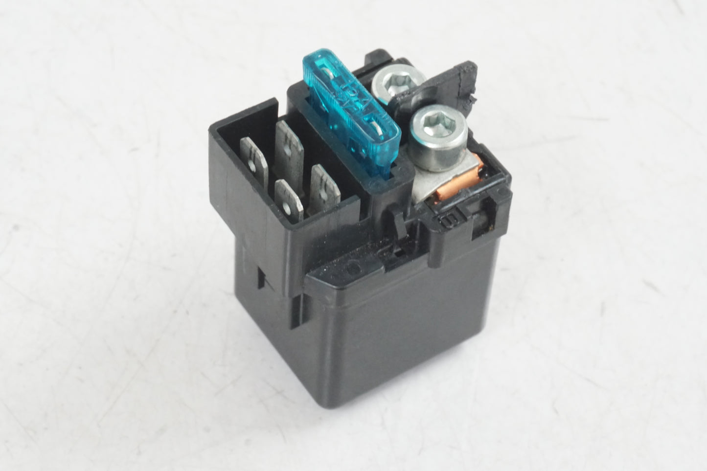 Snett uppifrån på Startrelä från en Honda ANF 125 -2008 motorcykel.