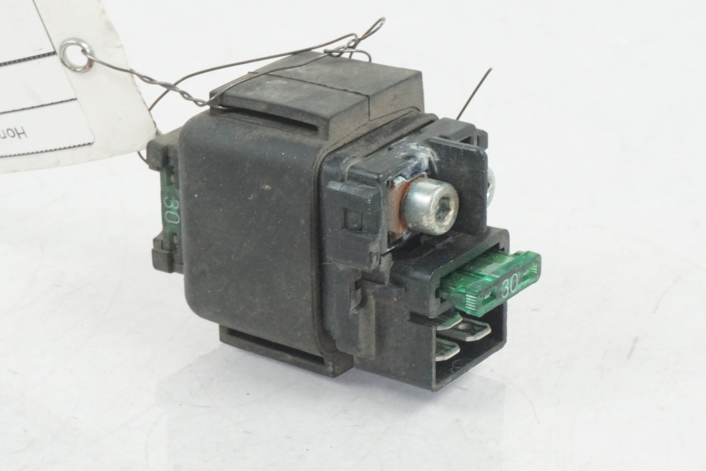 Baksidan på Startrelä från en Honda NT 650 V -1998 motorcykel.