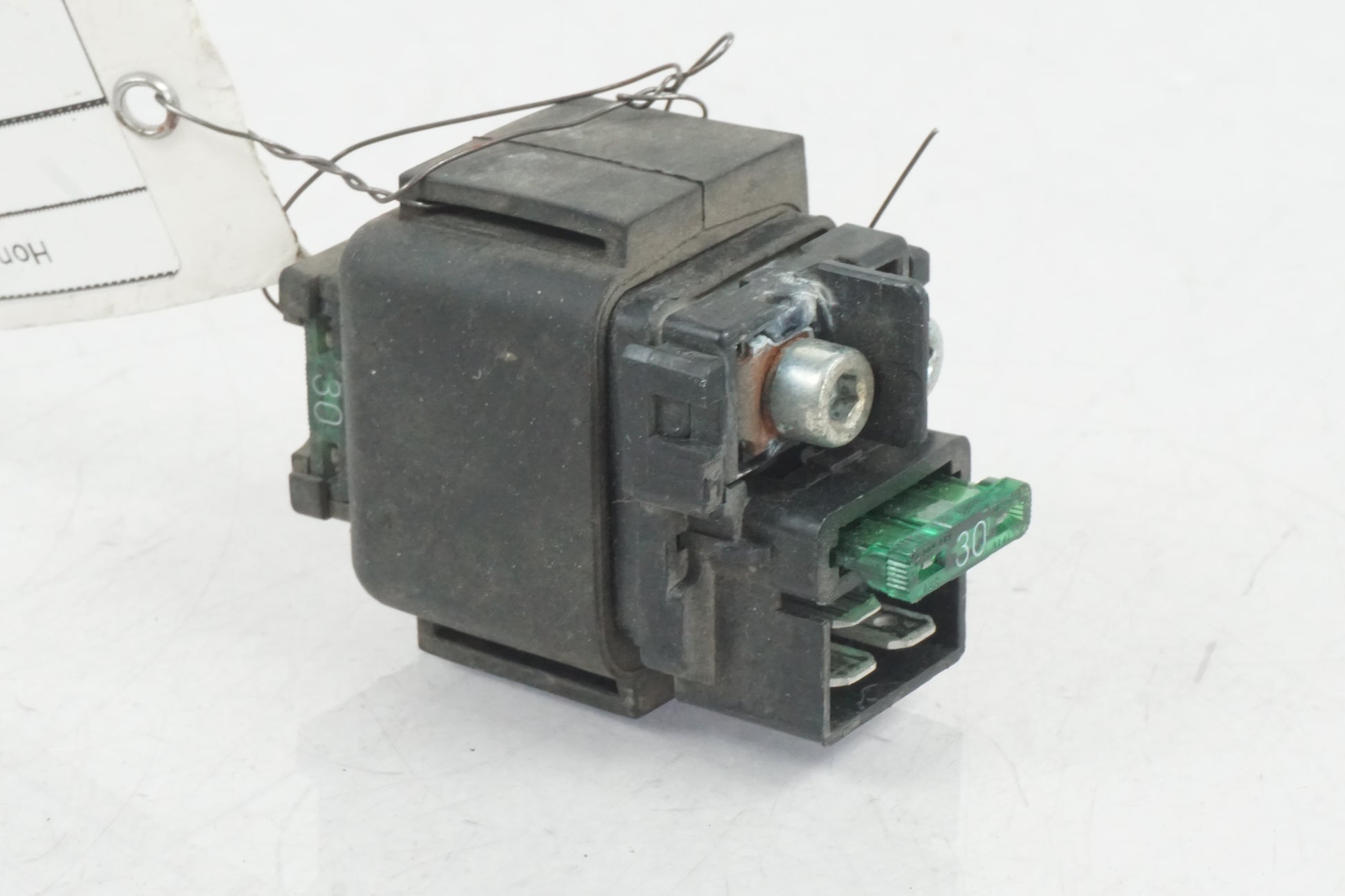 Baksidan på Startrelä från en Honda NT 650 V -1998 motorcykel.