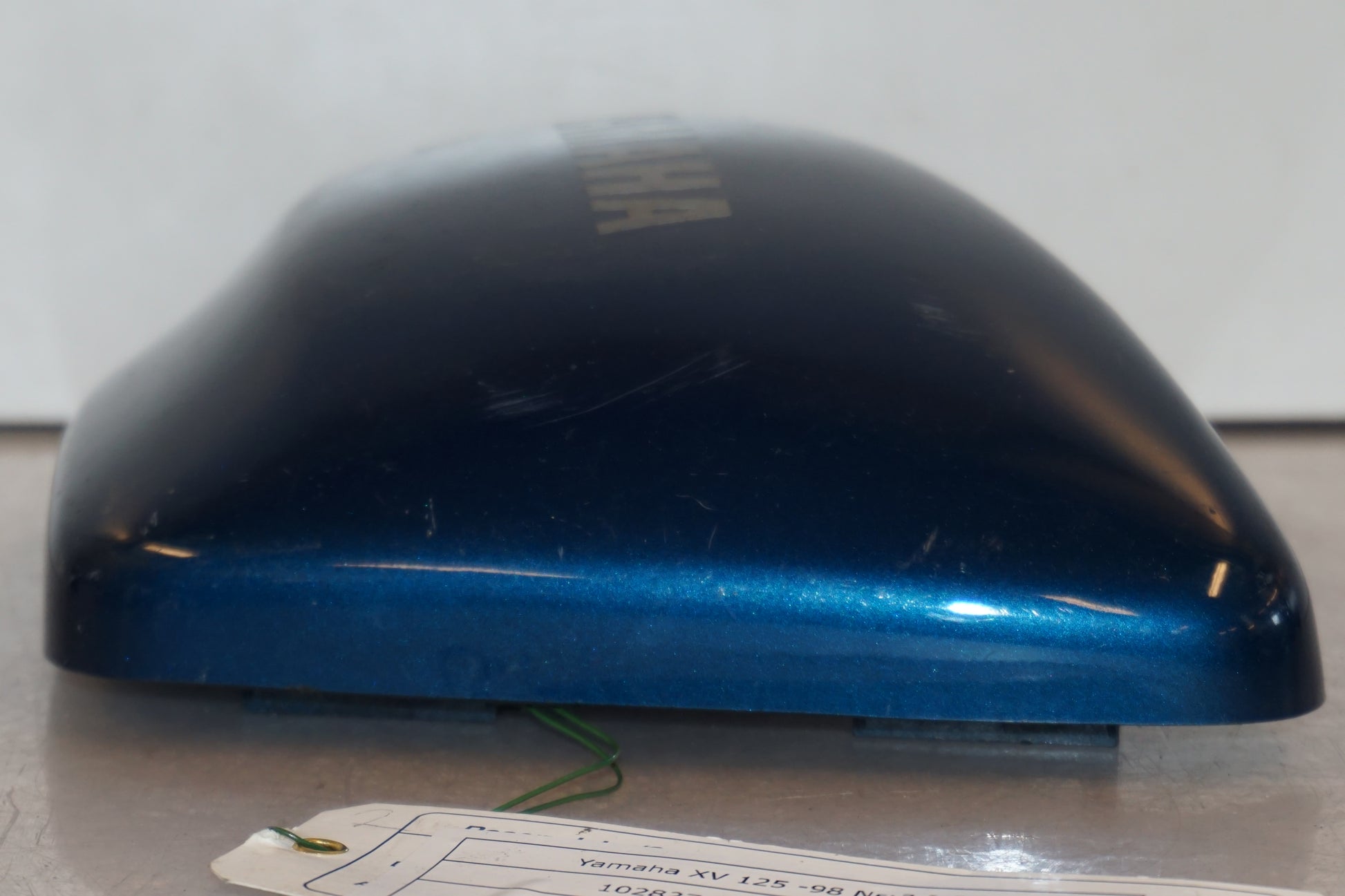 Snett uppifrån på Sidopanel från en Yamaha XV 125 -1998 motorcykel.