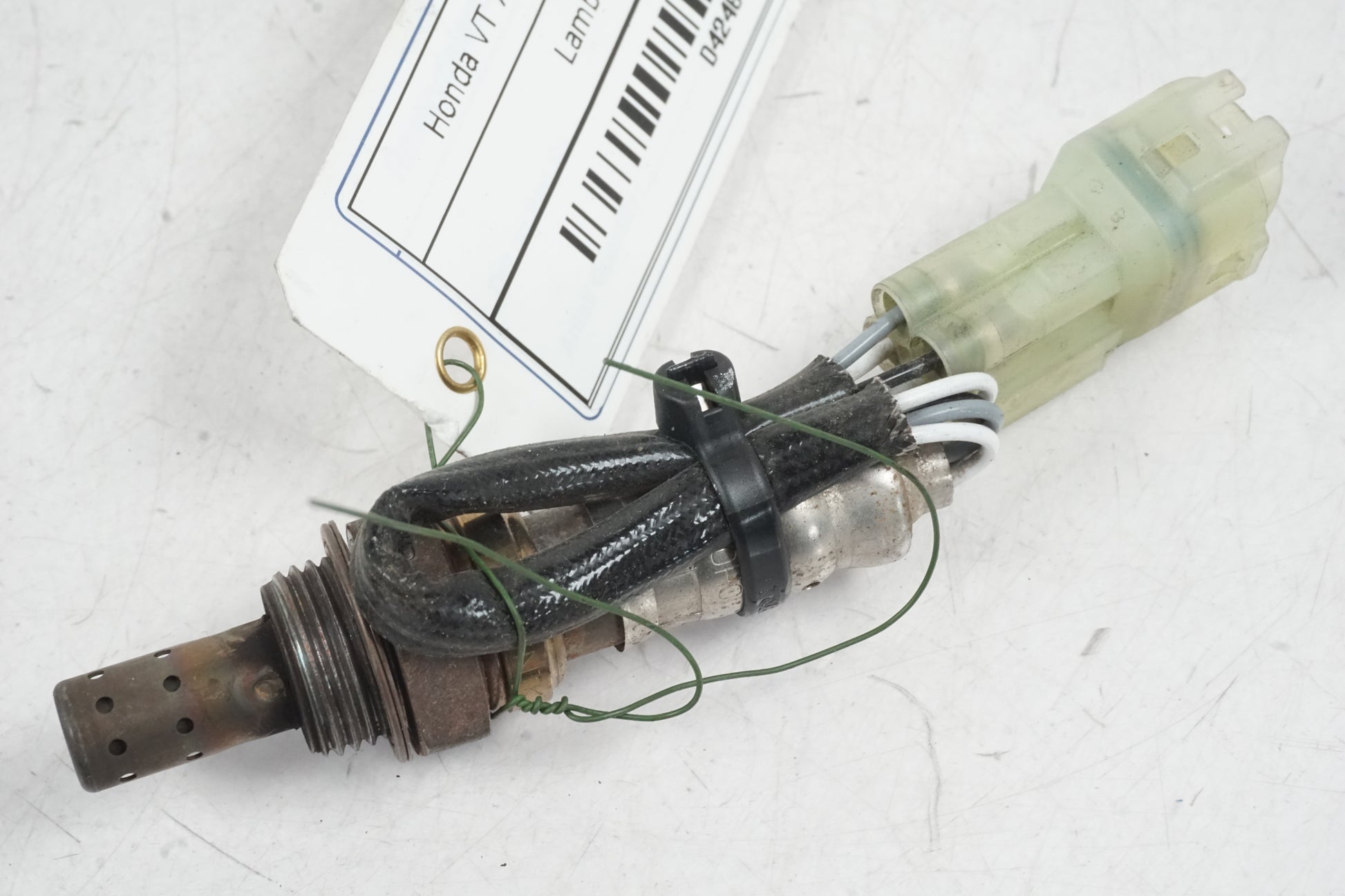 Framsidan på Lambdasond från en Honda VT 750 -2008 motorcykel.