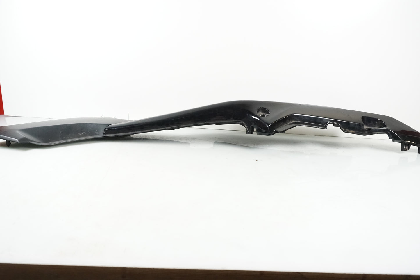 Höger sida på Bakvinge från en Honda CBR 125 R -2004 motorcykel.