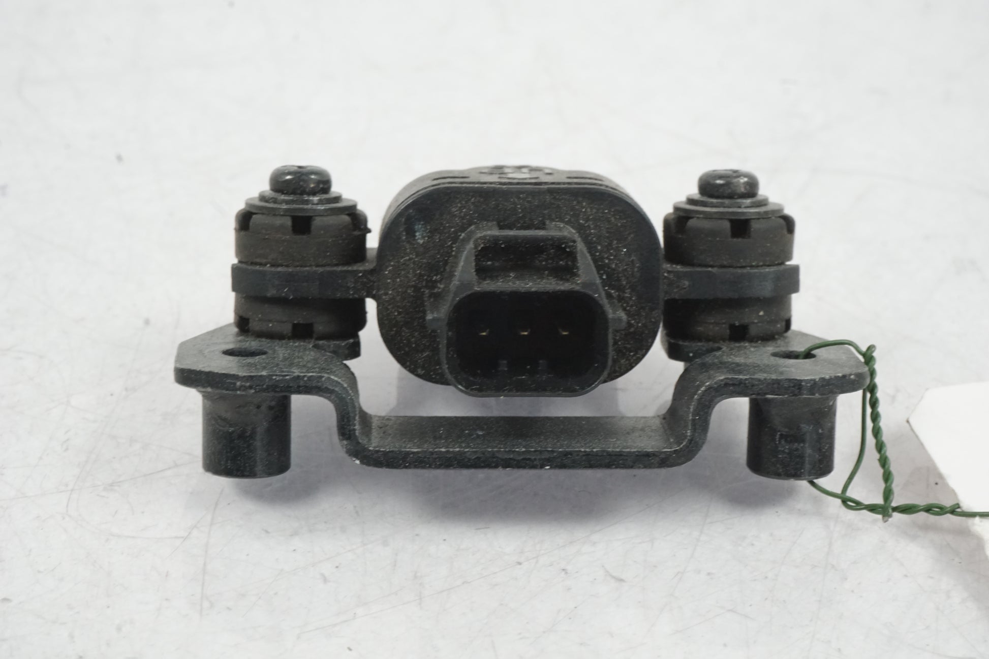 Baksidan på Tilt Sensor från en Honda CBR 125 R -2008 motorcykel.