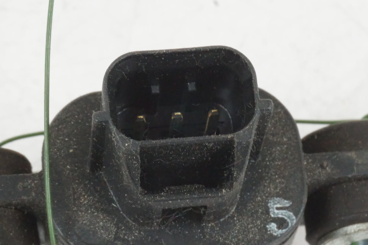 Höger sida på Tilt Sensor från en Honda ANF 125 -2008 motorcykel.