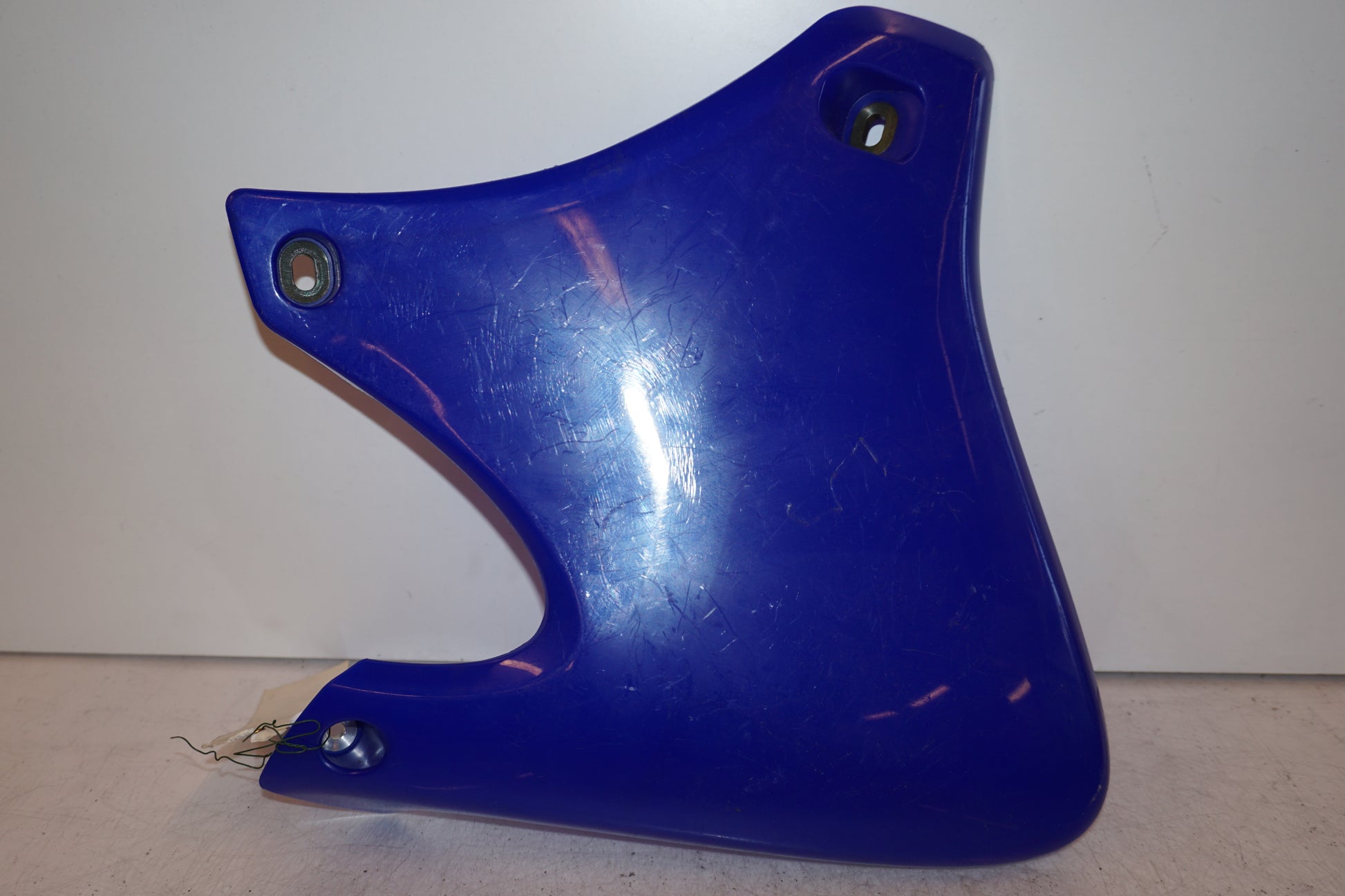 Framsidan på Sidopanel från en Yamaha WR 250 -2001 motorcykel.