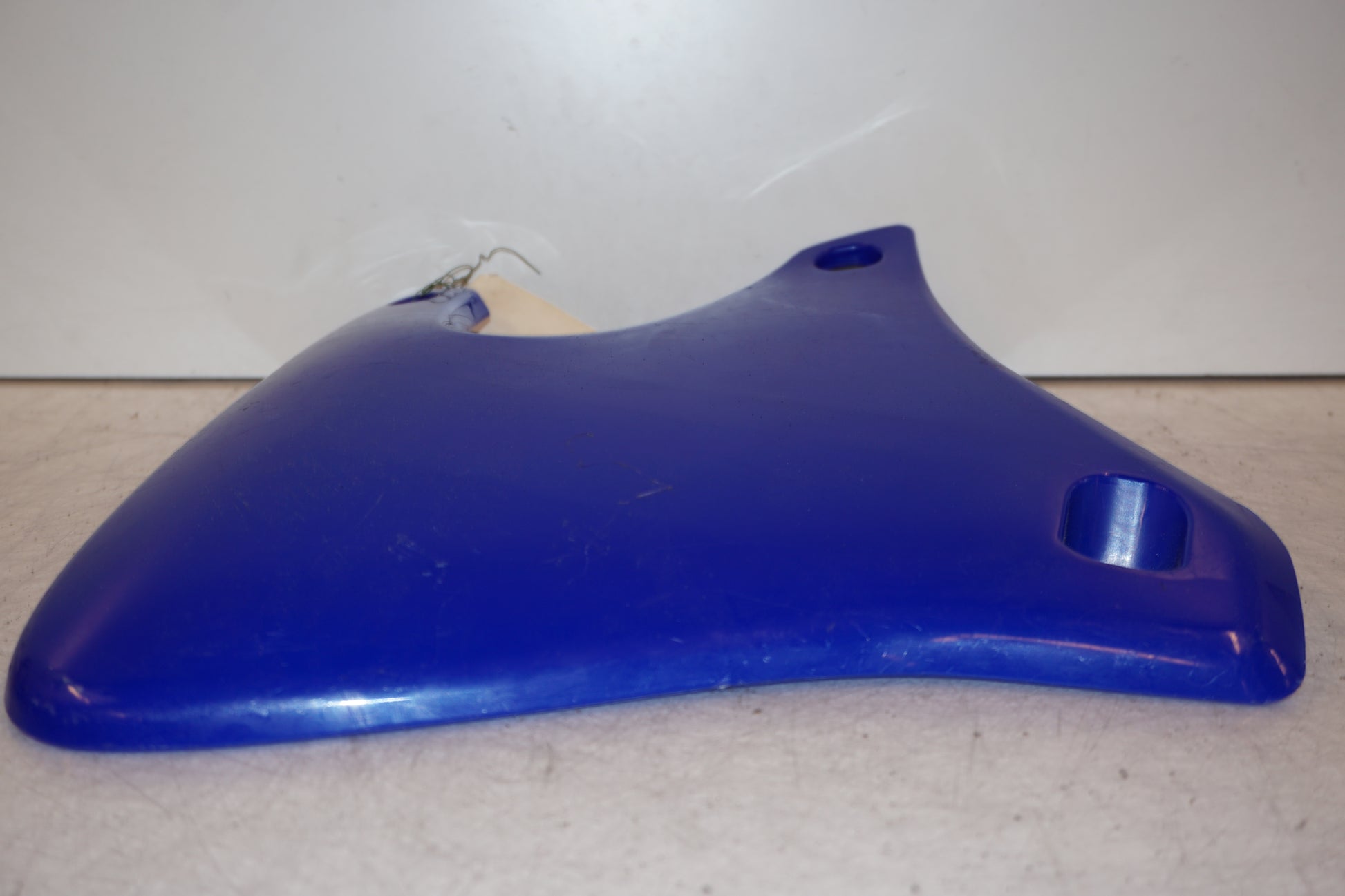 Snett uppifrån på Sidopanel från en Yamaha WR 250 -2001 motorcykel.