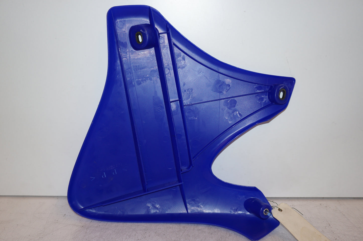 Snett nerifrån på Sidopanel från en Yamaha WR 250 -2001 motorcykel.