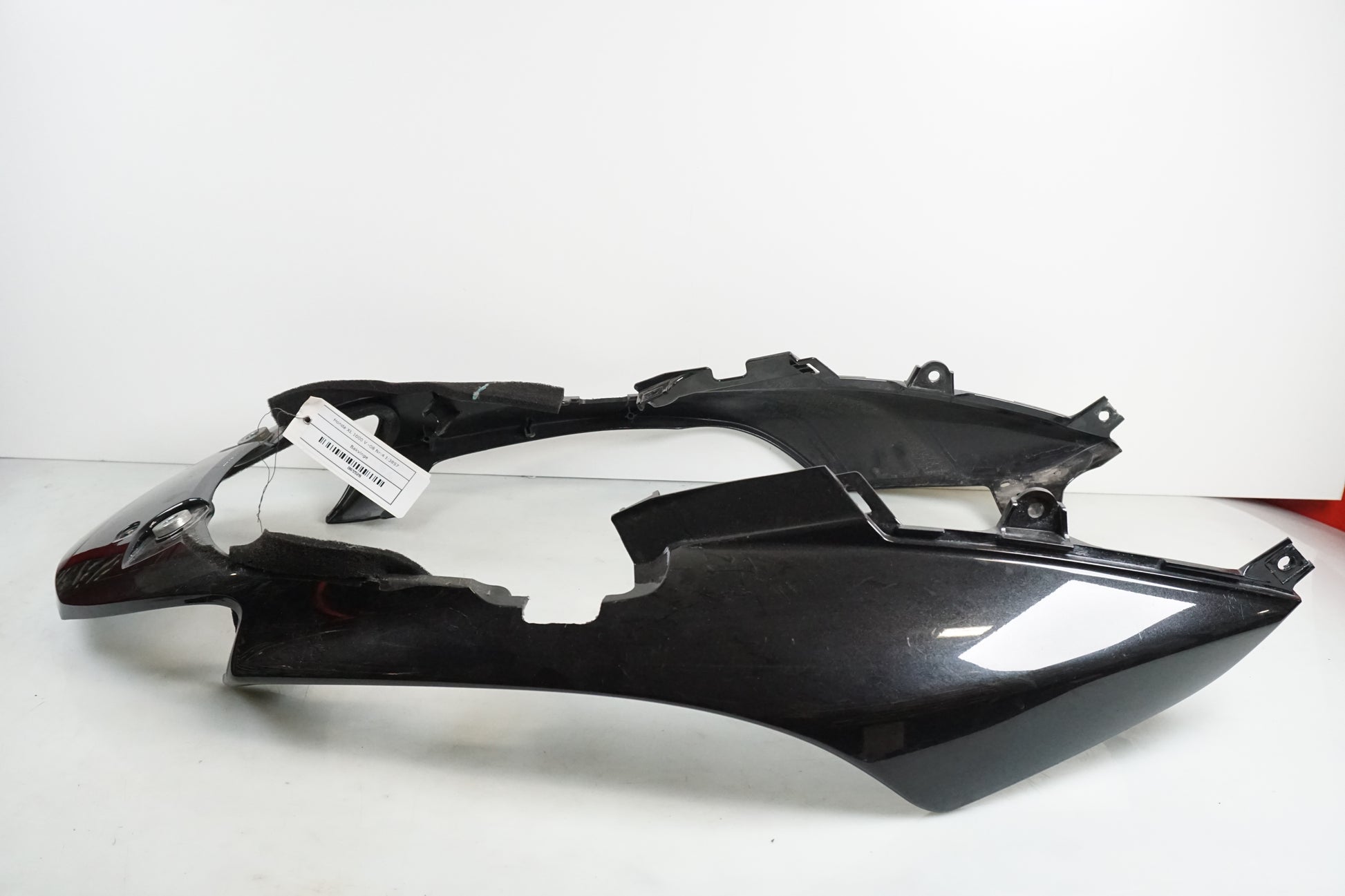 Höger sida på Bakvinge från en Honda XL 1000 V -2008 motorcykel.