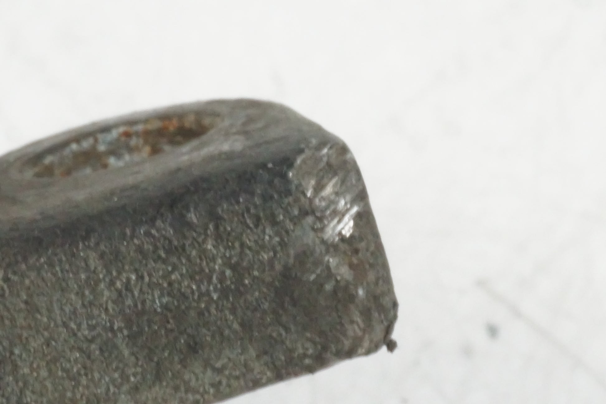 Snett nerifrån på Fotpinne från en Buell X1 Lightning -2002 motorcykel.