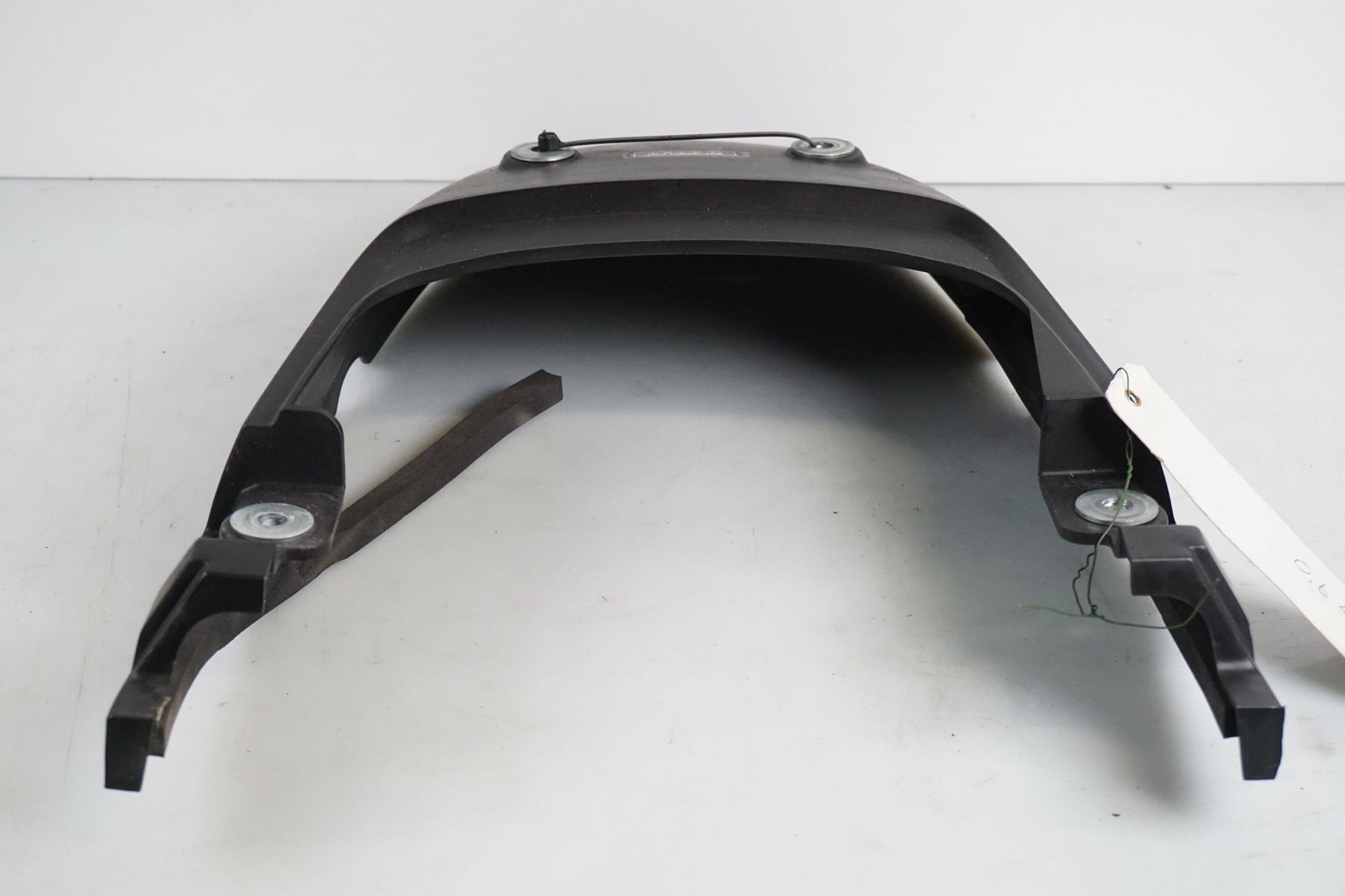 Vänster sida på Bakvinge från en Honda XL 650 V -2000 motorcykel.