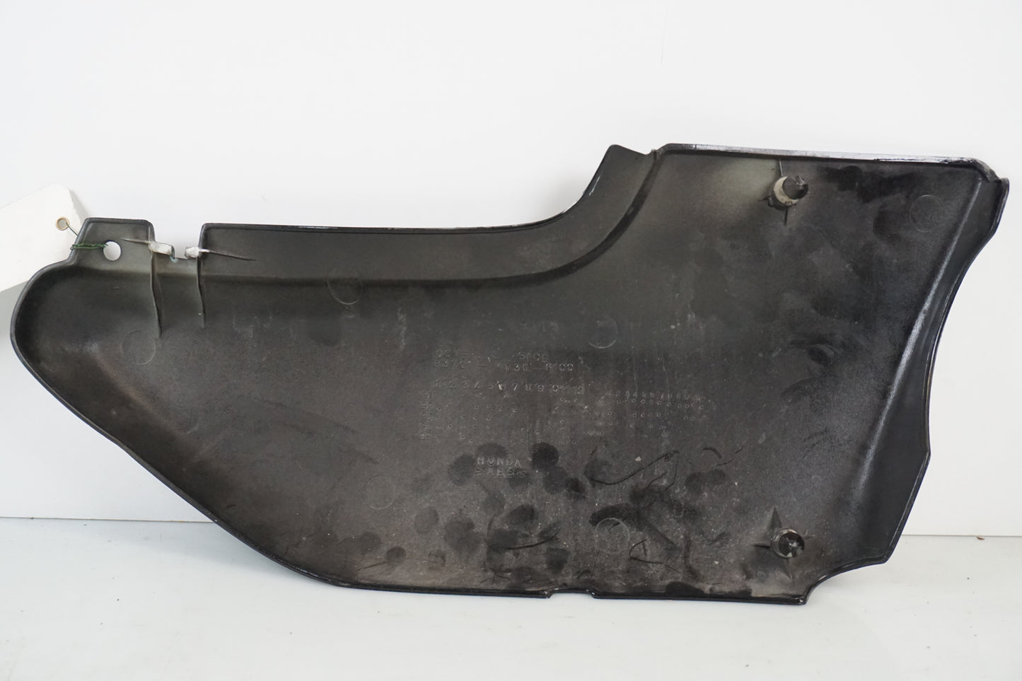 Snett nerifrån på Sidopanel från en Honda CB 750 SF -1999 motorcykel.