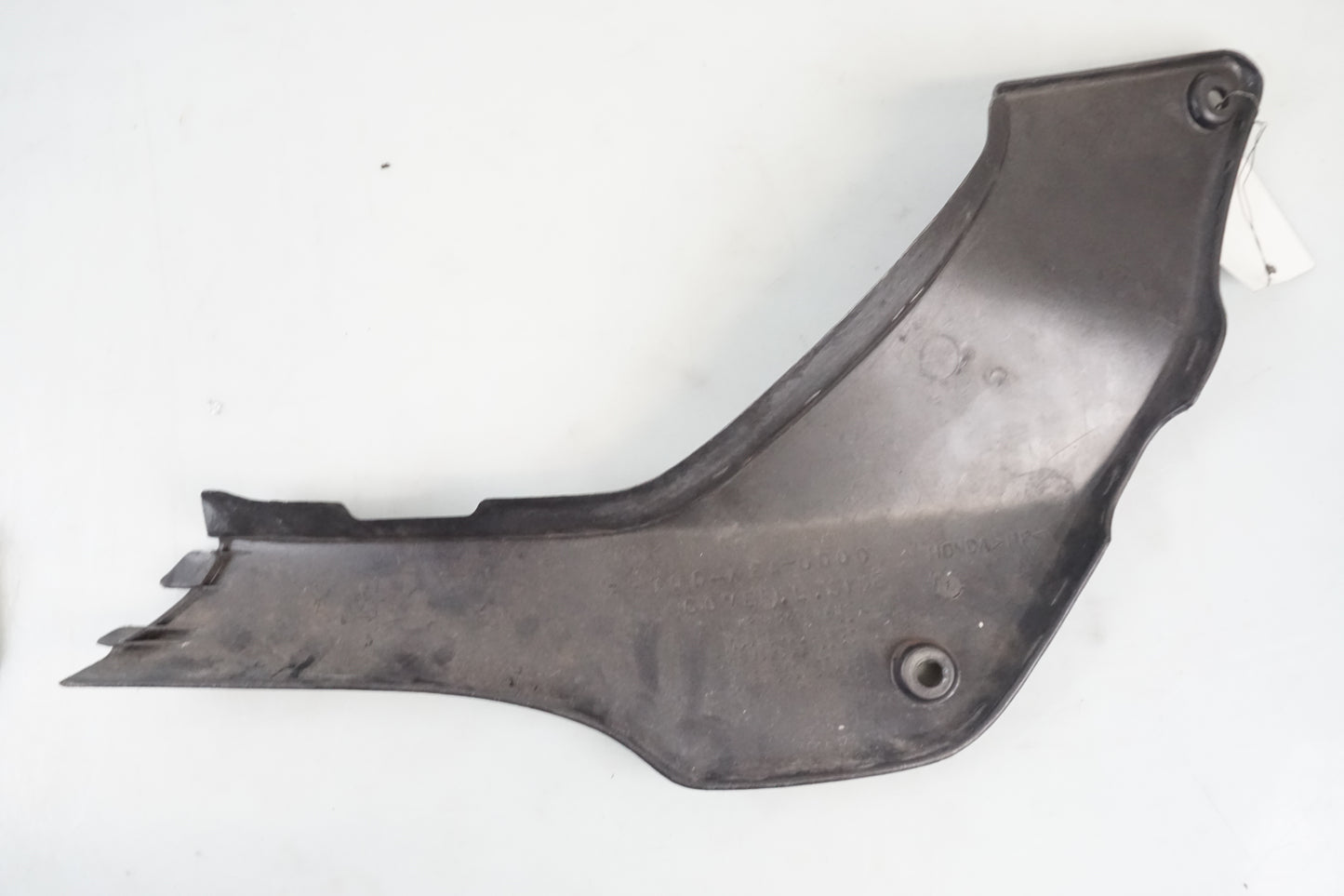 Snett nerifrån på Sidopanel från en Honda CB 600 Hornet -2001 motorcykel.