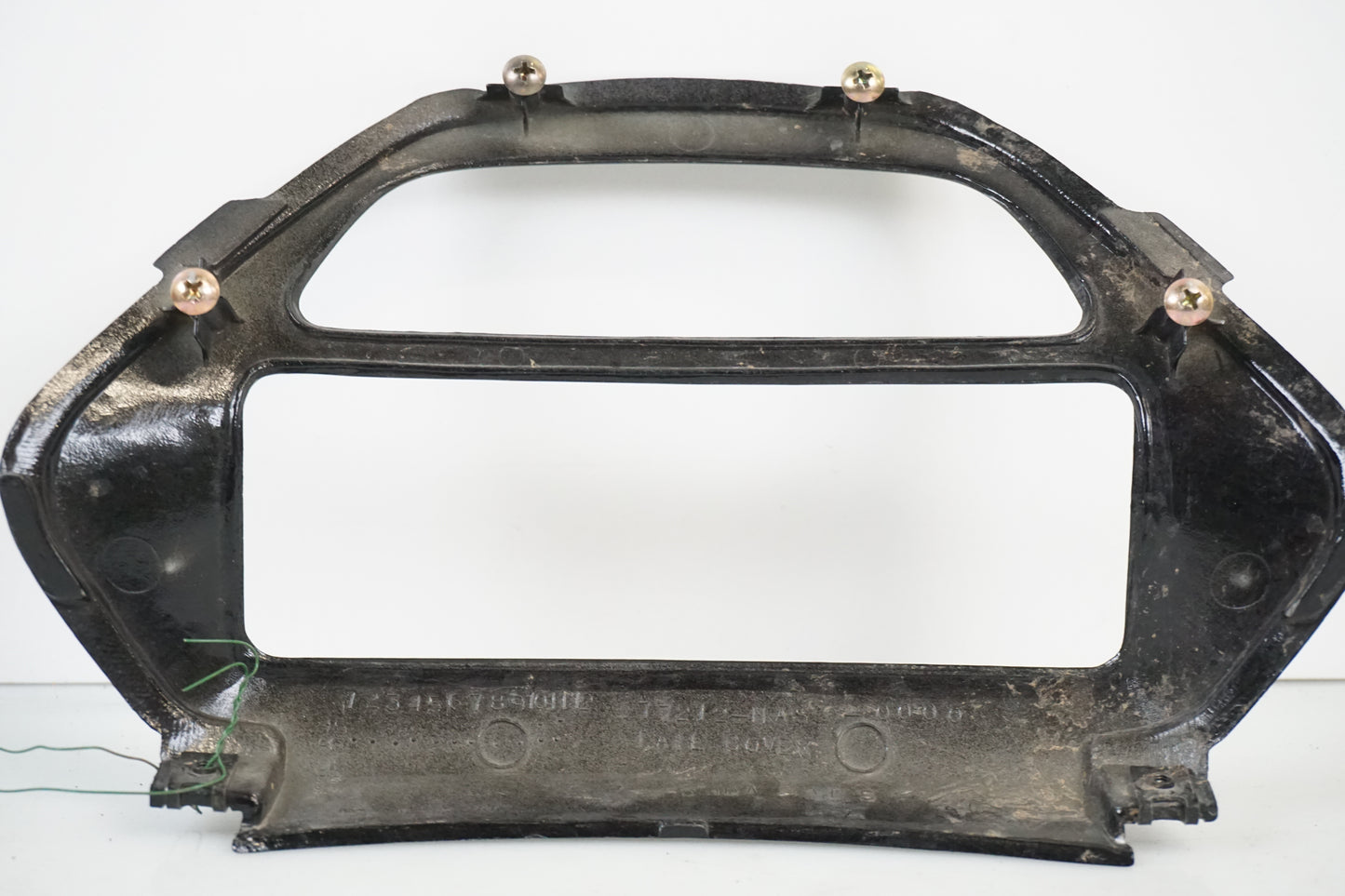 Snett nerifrån på Baklampplast från en Honda CBR 900 RR -1997 motorcykel.