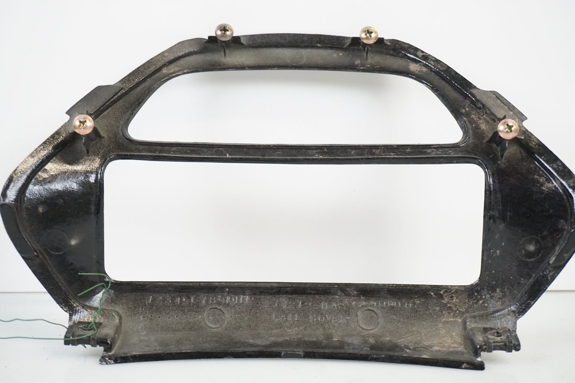 Snett nerifrån på Baklampplast från en Honda CBR 900 RR -1997 motorcykel.