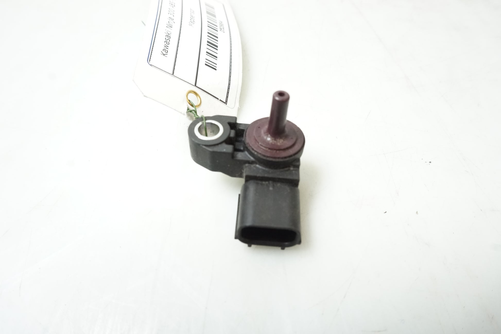 Baksidan på Mapsensor från en Kawasaki Ninja 300 -2014 motorcykel.