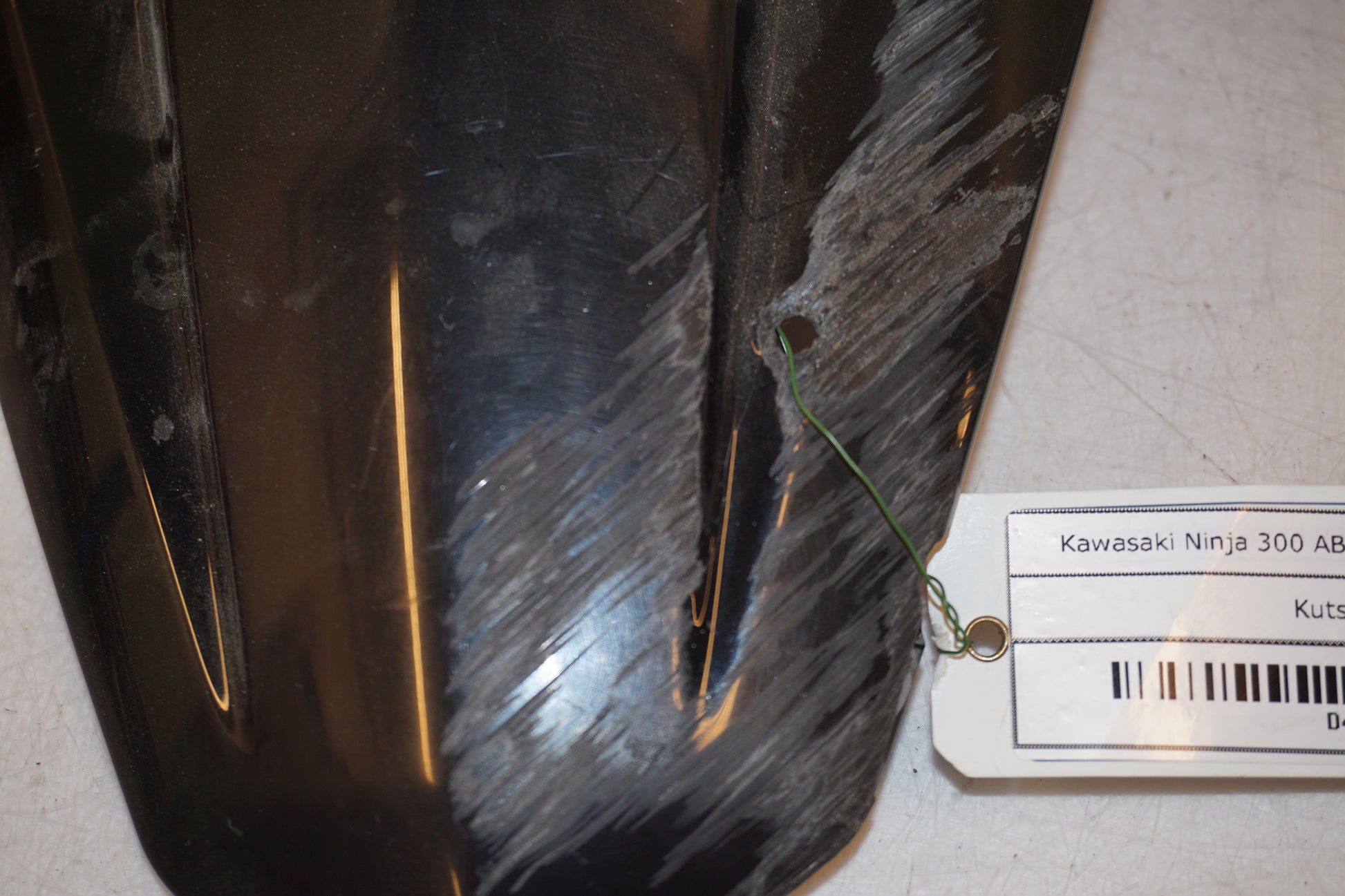 Extrabild5 på Kuts från en Kawasaki Ninja 300 -2013 motorcykel.