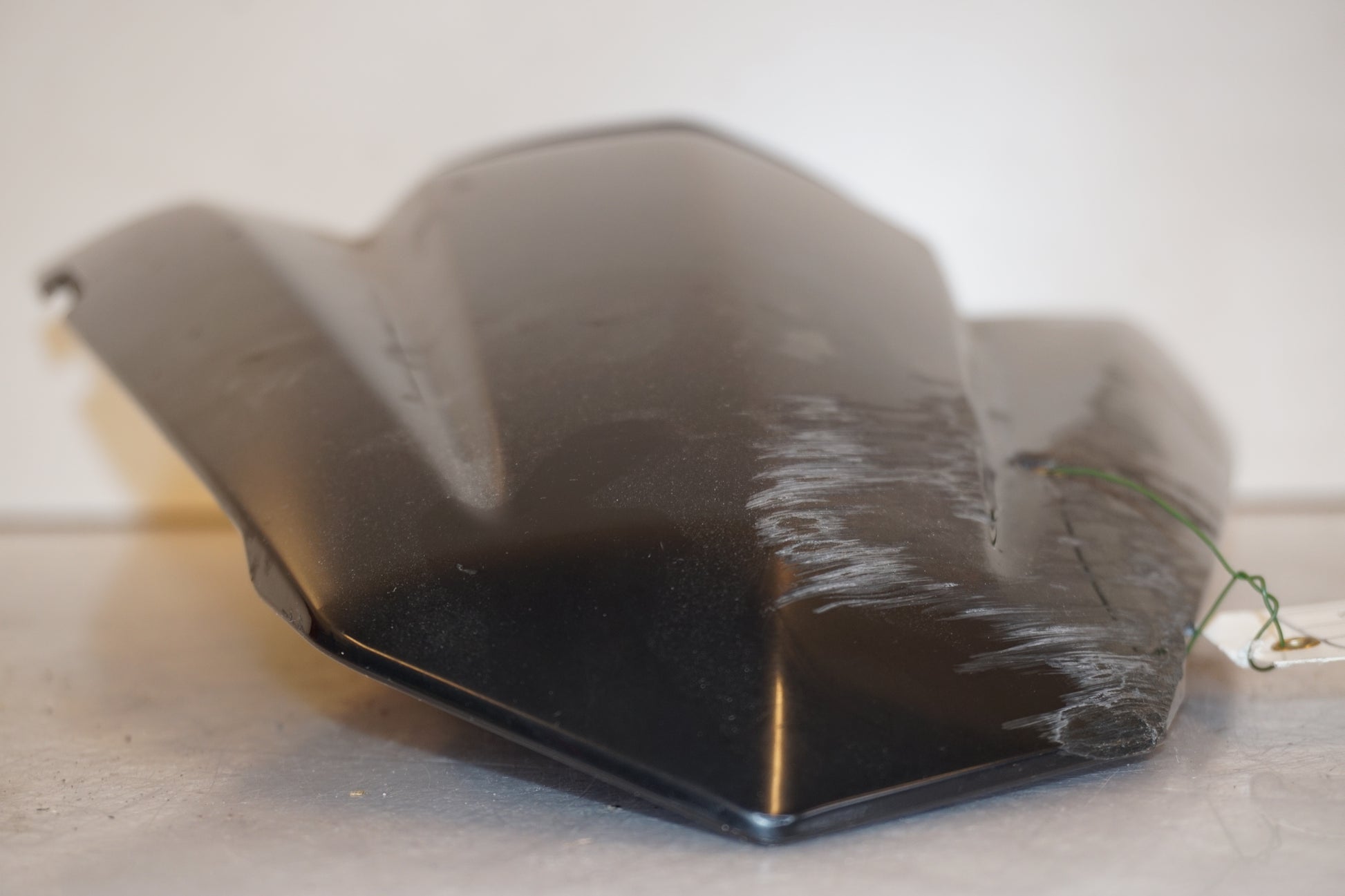 Baksidan på Kuts från en Kawasaki Ninja 300 -2013 motorcykel.