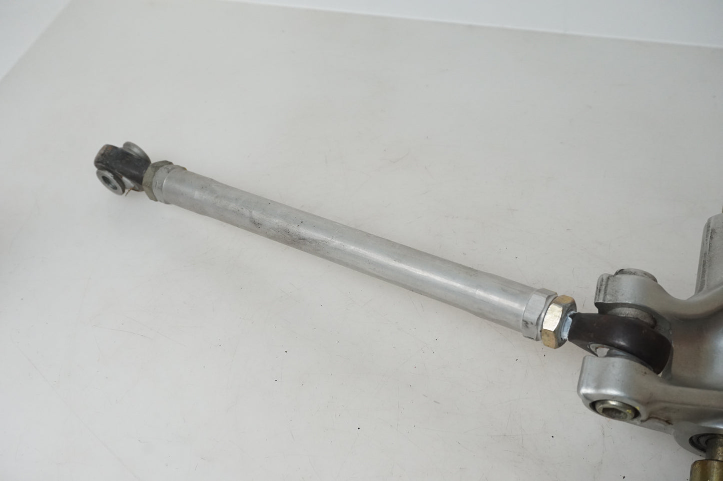 Liaison d'amortisseur