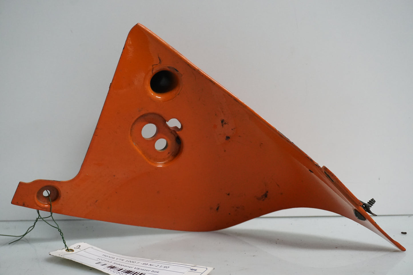 Framsidan på Sidopanel från en Honda VTR 1000 F -1999 motorcykel.