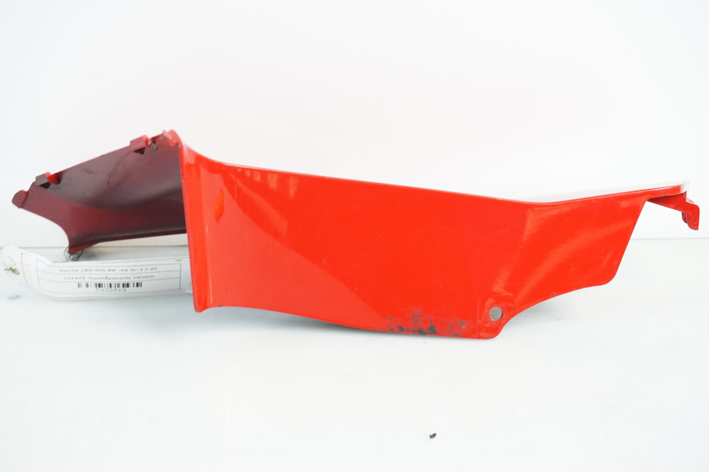 Baksidan på Toppkåpsinsida från en Honda CBR 600 RR -2004 motorcykel.