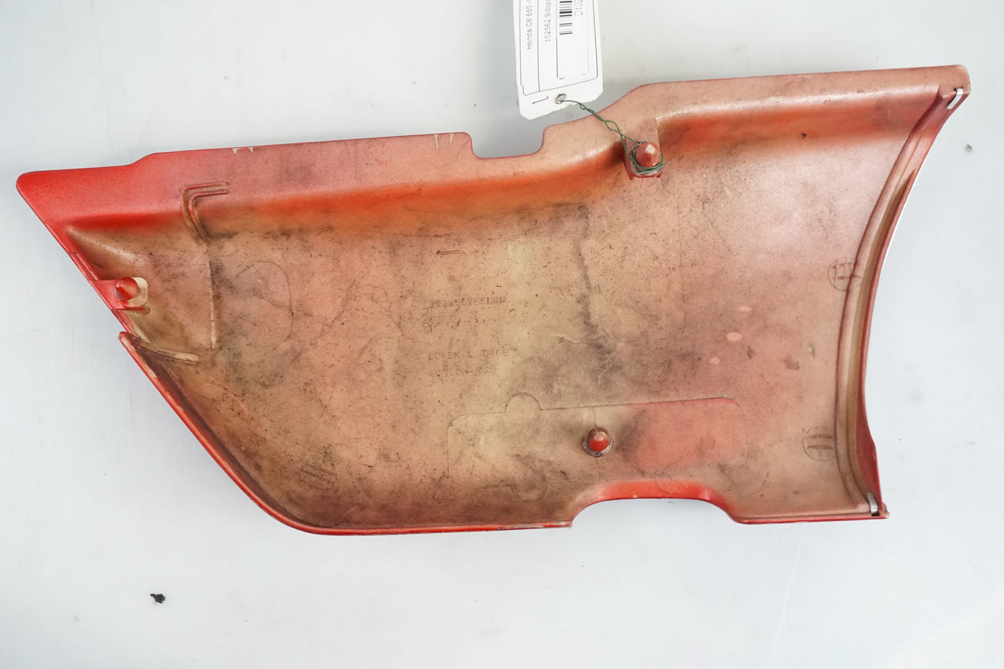 Snett nerifrån på Sidopanel från en Honda CB 650 -1980 motorcykel.