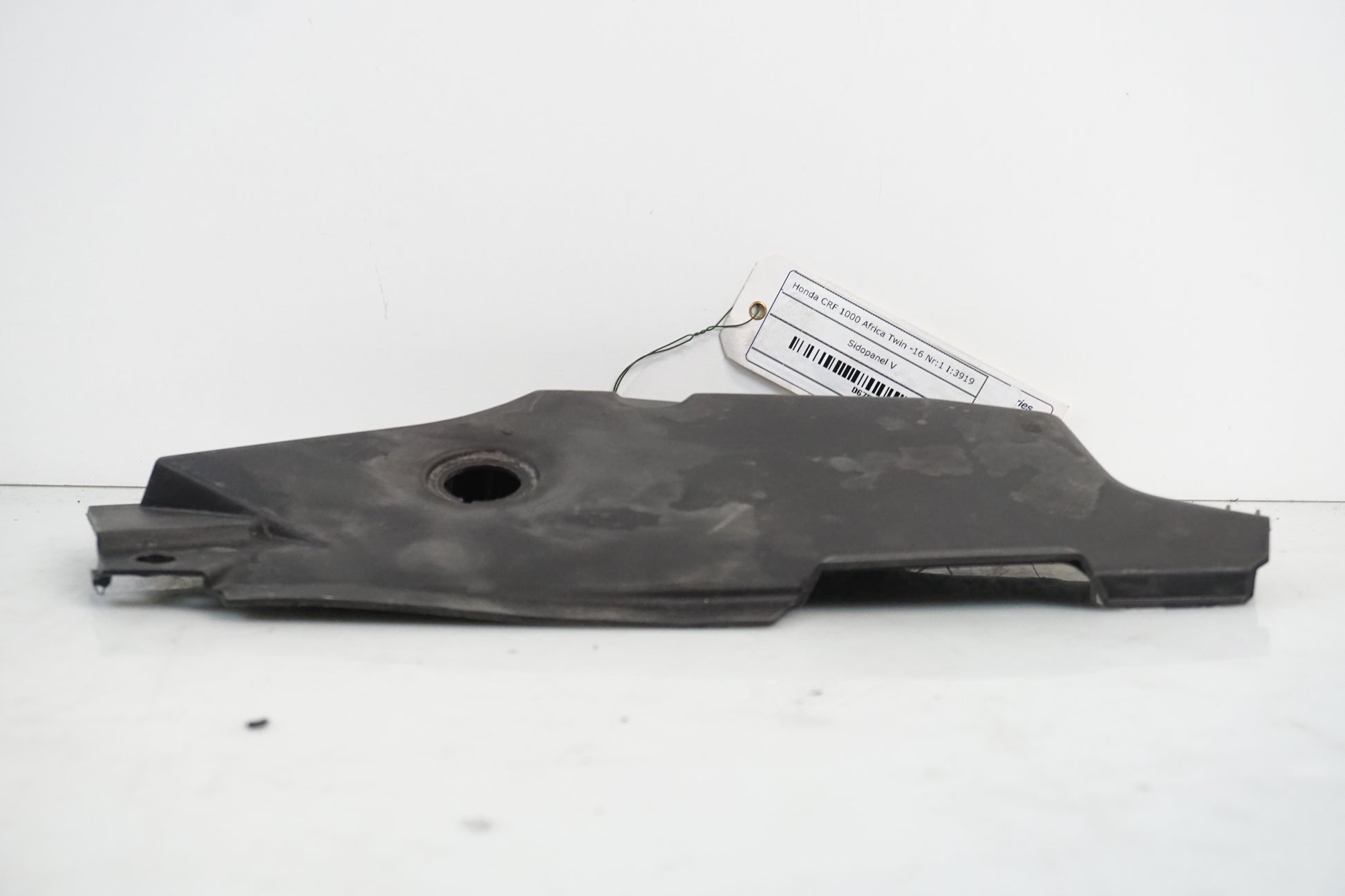 Baksidan på Sidopanel från en Honda CRF 1000 Africa Twin -2016 motorcykel.